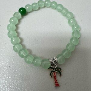 Green Beaded Bracelet with Palm Tree Charm